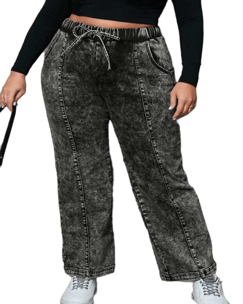Back of a model wearing a size 2x Black Plus Size Tie Dye Drawstring Splicing Wide Leg Jeans in Black by Très Chic. | dia_product_style_image_id:320215